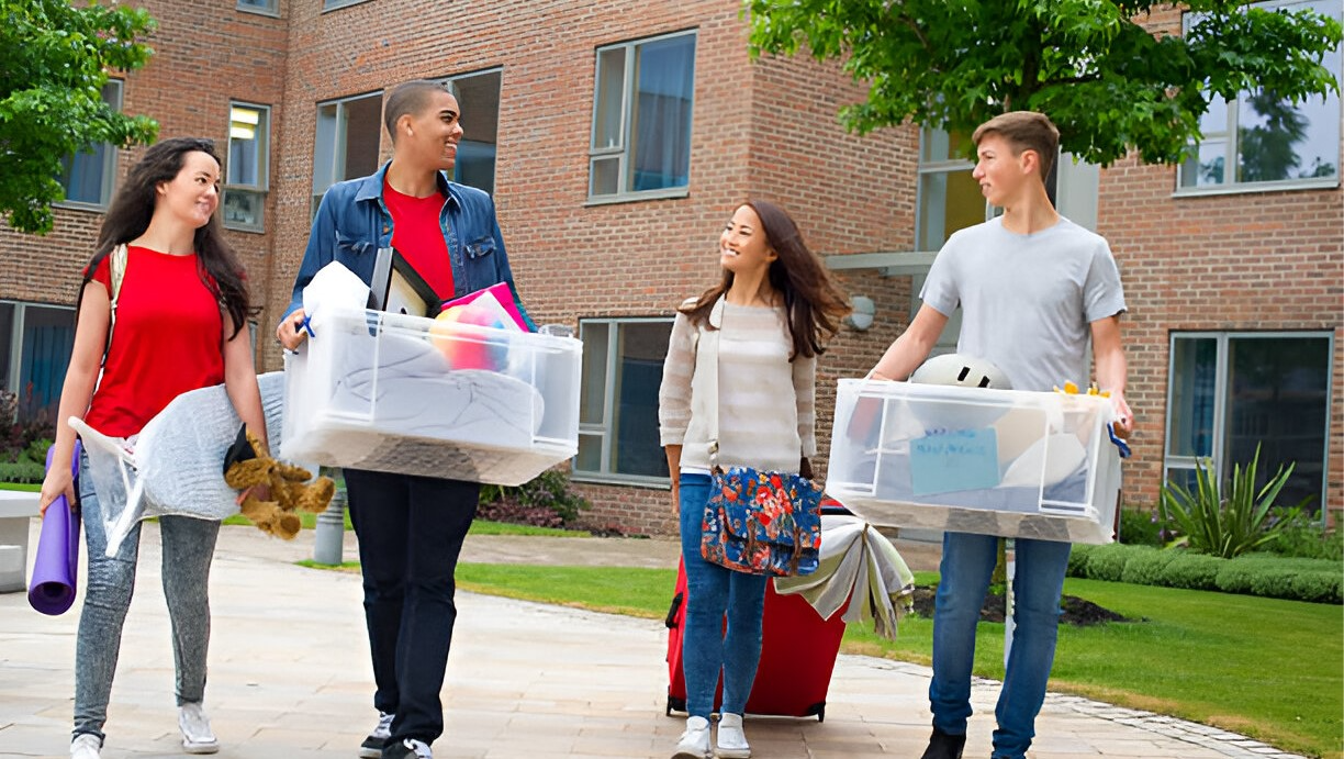 students packing into their dormitories