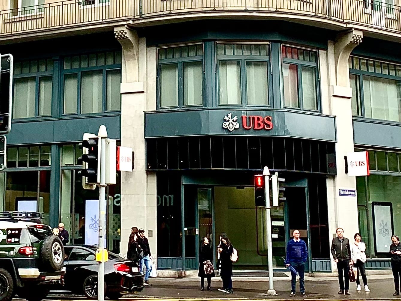 People outside a UBS building